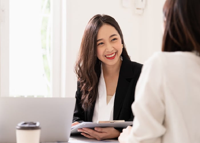 Business woman meeting with client.