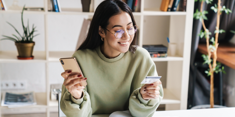 girl-with-phone-and-credit-card