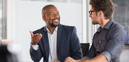 businessman-talking-with-client-about-checking