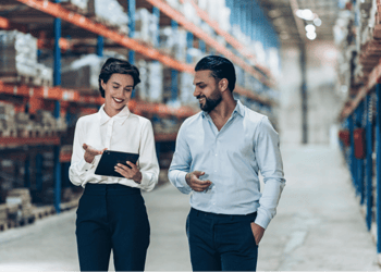 business-man-and-woman-in-a-warehouse
