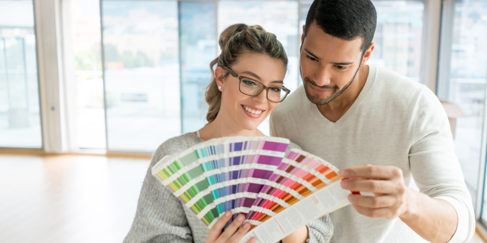 Couple picking out paint colors