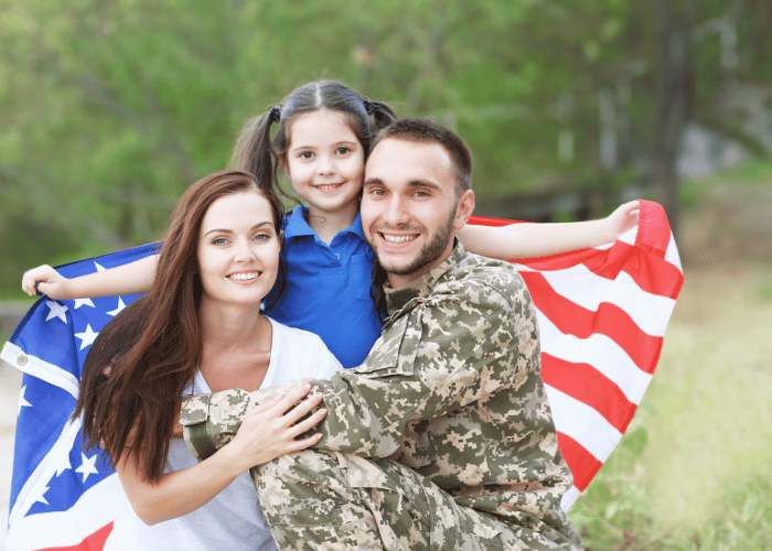military family with flag